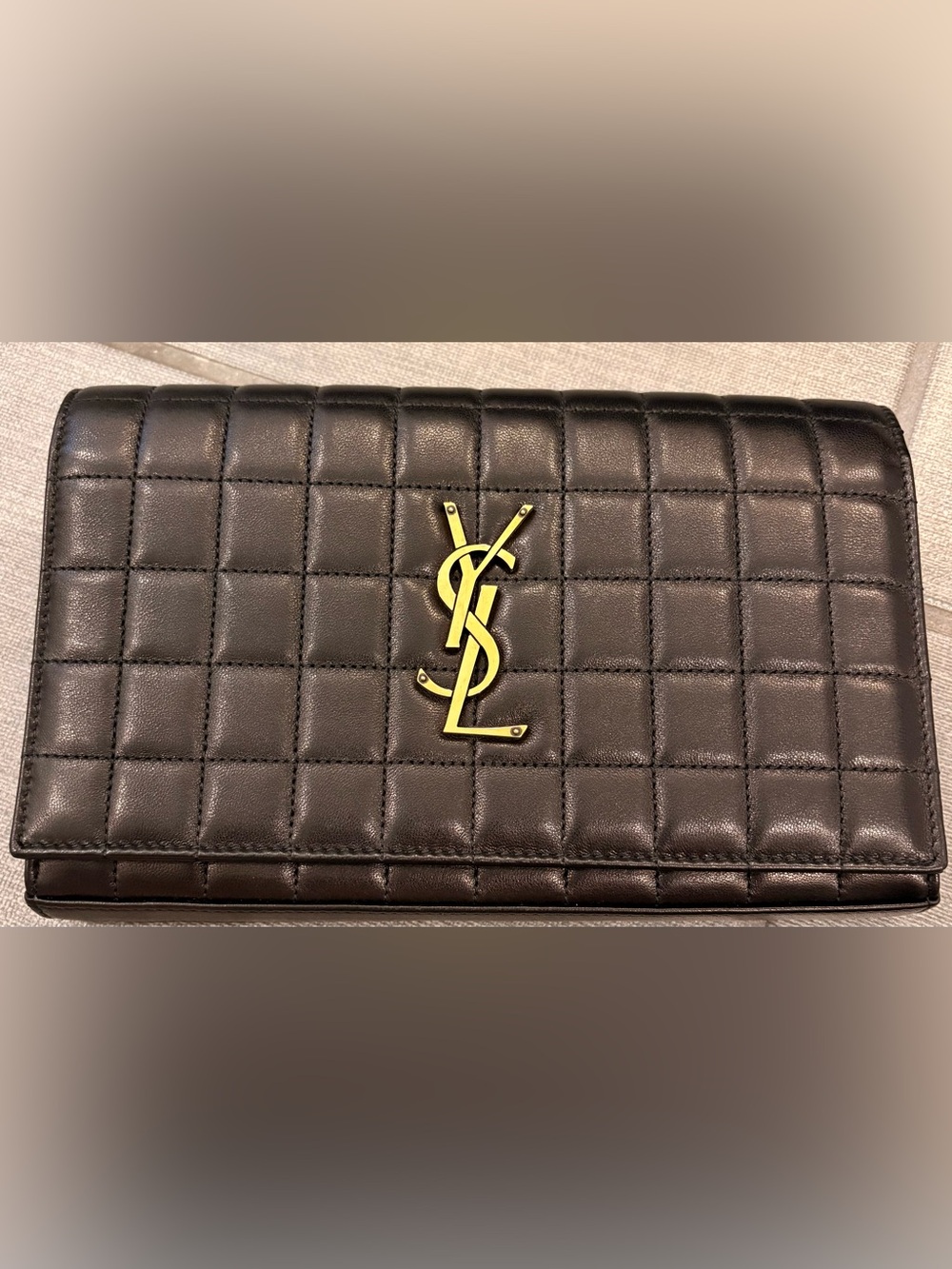 YSL Cassandre in black quilted smooth leather